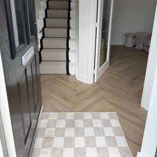 Mustique - Rene Herringbone in a hallway